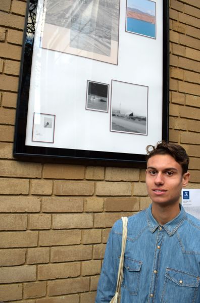 Jake Almeida in front of his artwork, 'within a rise, there lies a scission' (2017 - 2018), on display at the Outdoor Gallery