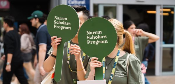 Two Narrm Scholar casual staff working at the Pre-Orientation Camp