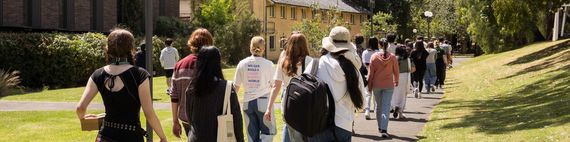 Narrm Scholars walking on campus during camp