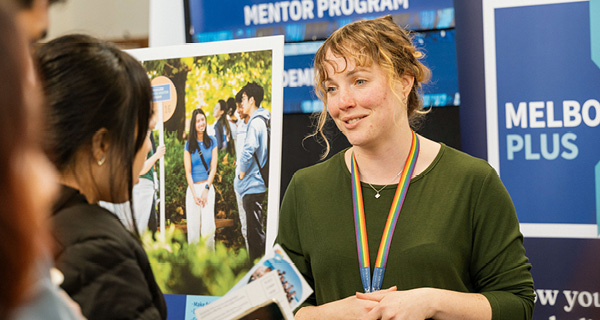 A group of students chatting at a fair