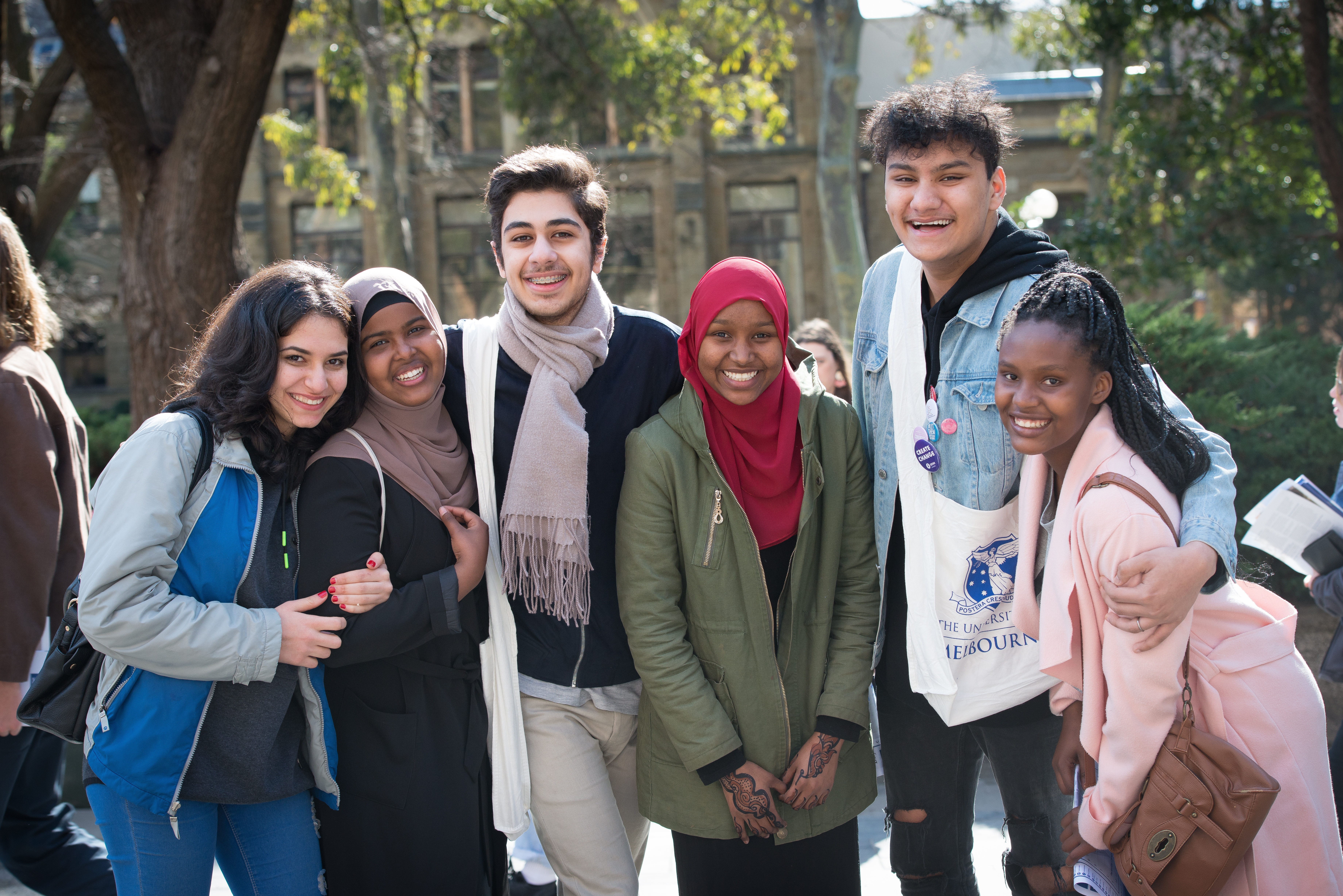 A group of six University of Melbourne students smiling.