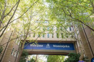 Photograph of the Welcome Wominjeka sign in Parkville Campus entrance for Zoom background