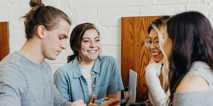 EmpWk2023_EventTiles_700x350px_MASTER_FILE_STUDENTS Four students sitting and chatting