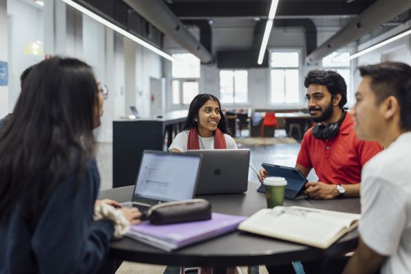 A group of students studying in a group setting