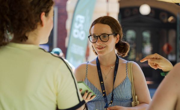 Narm Scholar meeting new people at the services expo